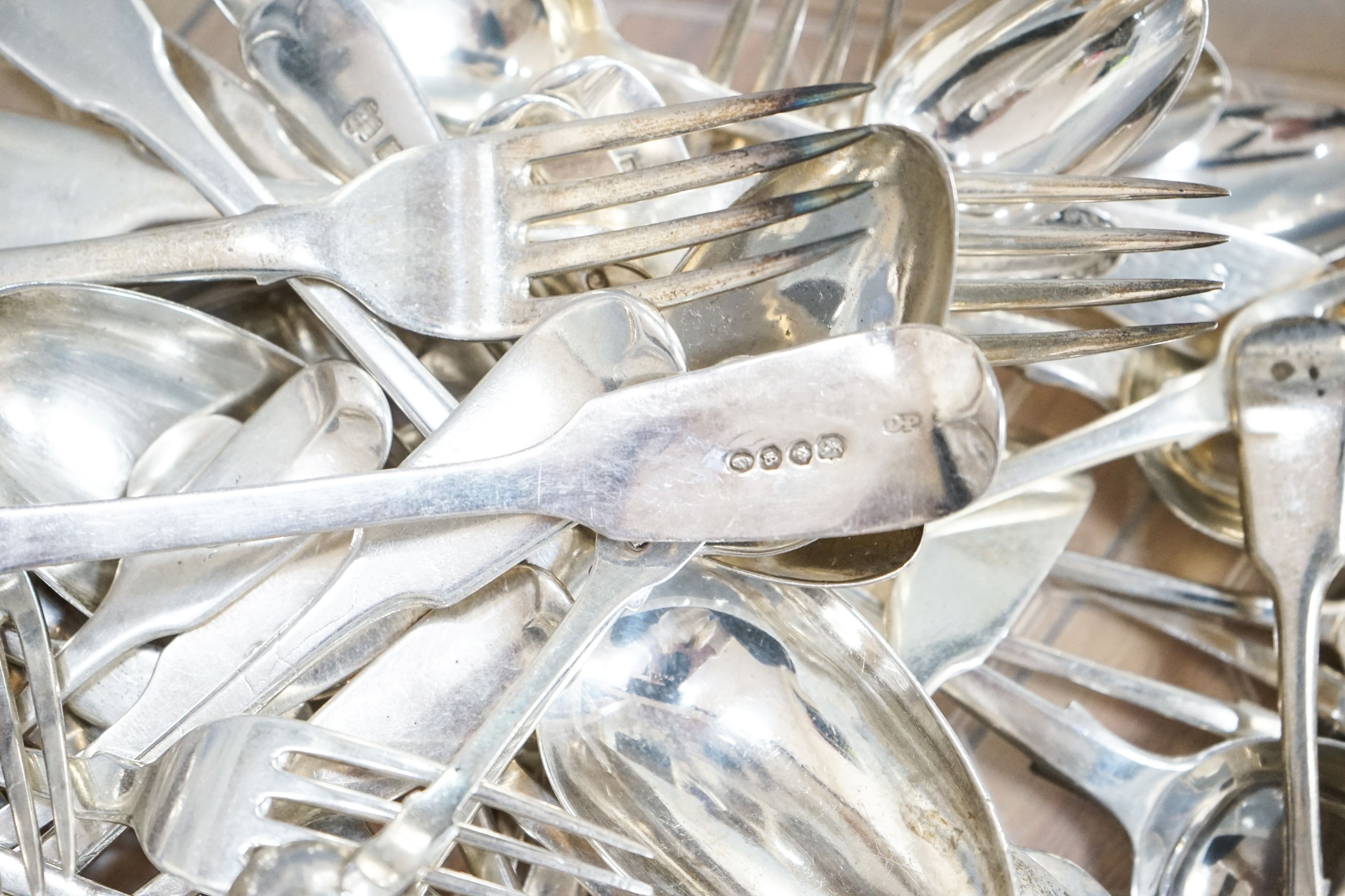 A mixed quantity of assorted mainly 19th century silver flatware, various dates, maker's and patterns, 65.5 oz.